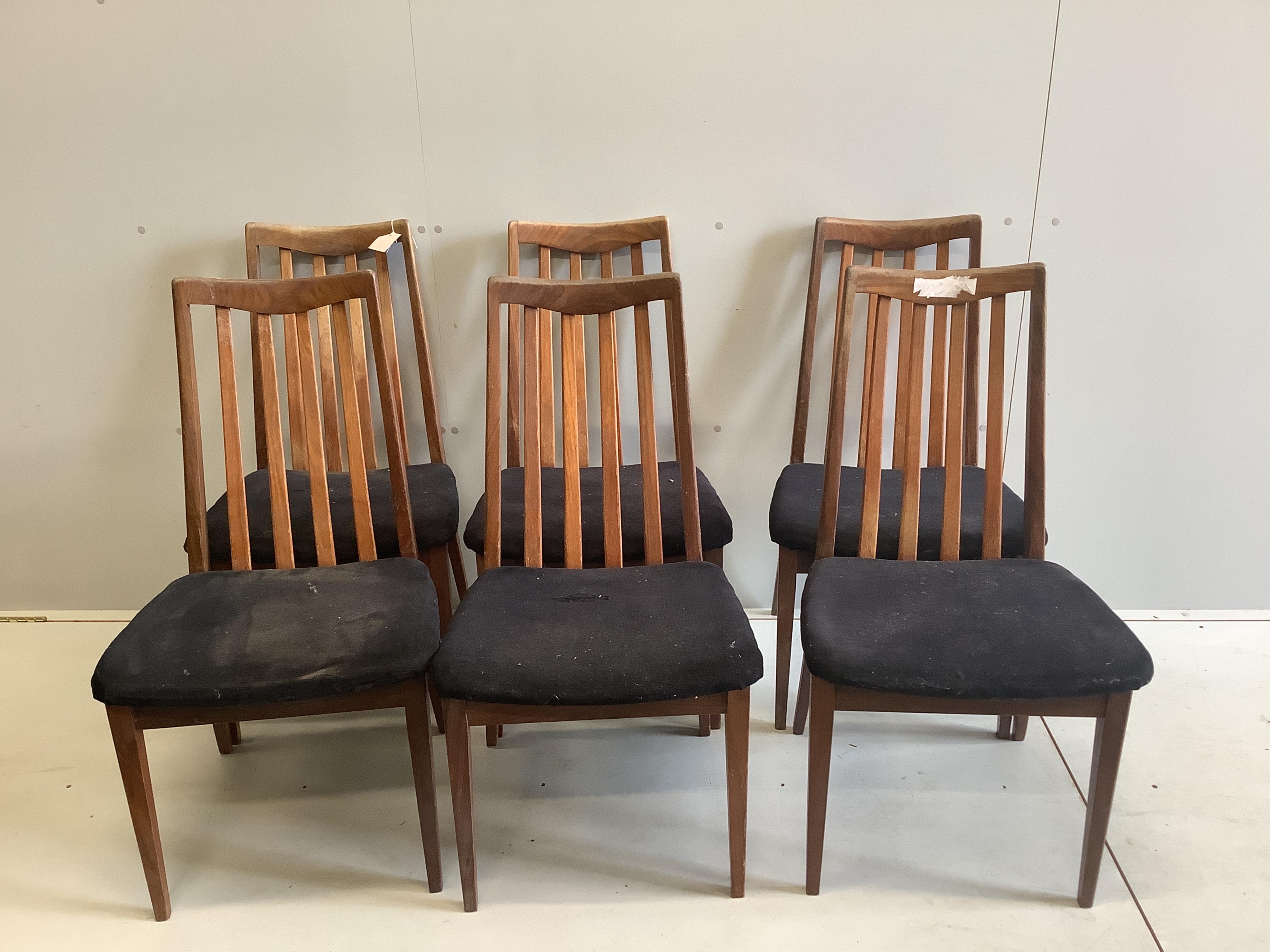 A G Plan circular teak extending dining table, diameter 120cm, height 74cm, and six chairs. Condition - fair